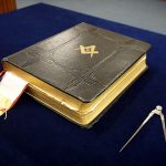 Masonic Bible square and compasses on altar