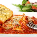 Lasagna, garlic bread and salad